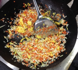 Frying vegetables with eggs